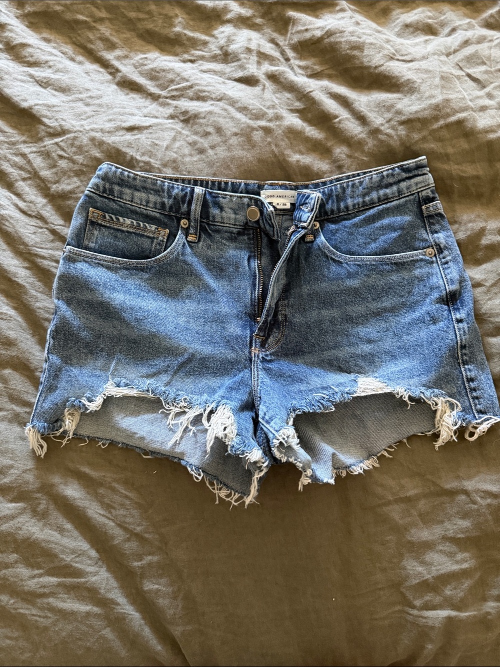 Good American Distressed Light Blue Denim Shorts